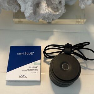 Pura car diffuser and Capri Blue Volcano diffuser refill